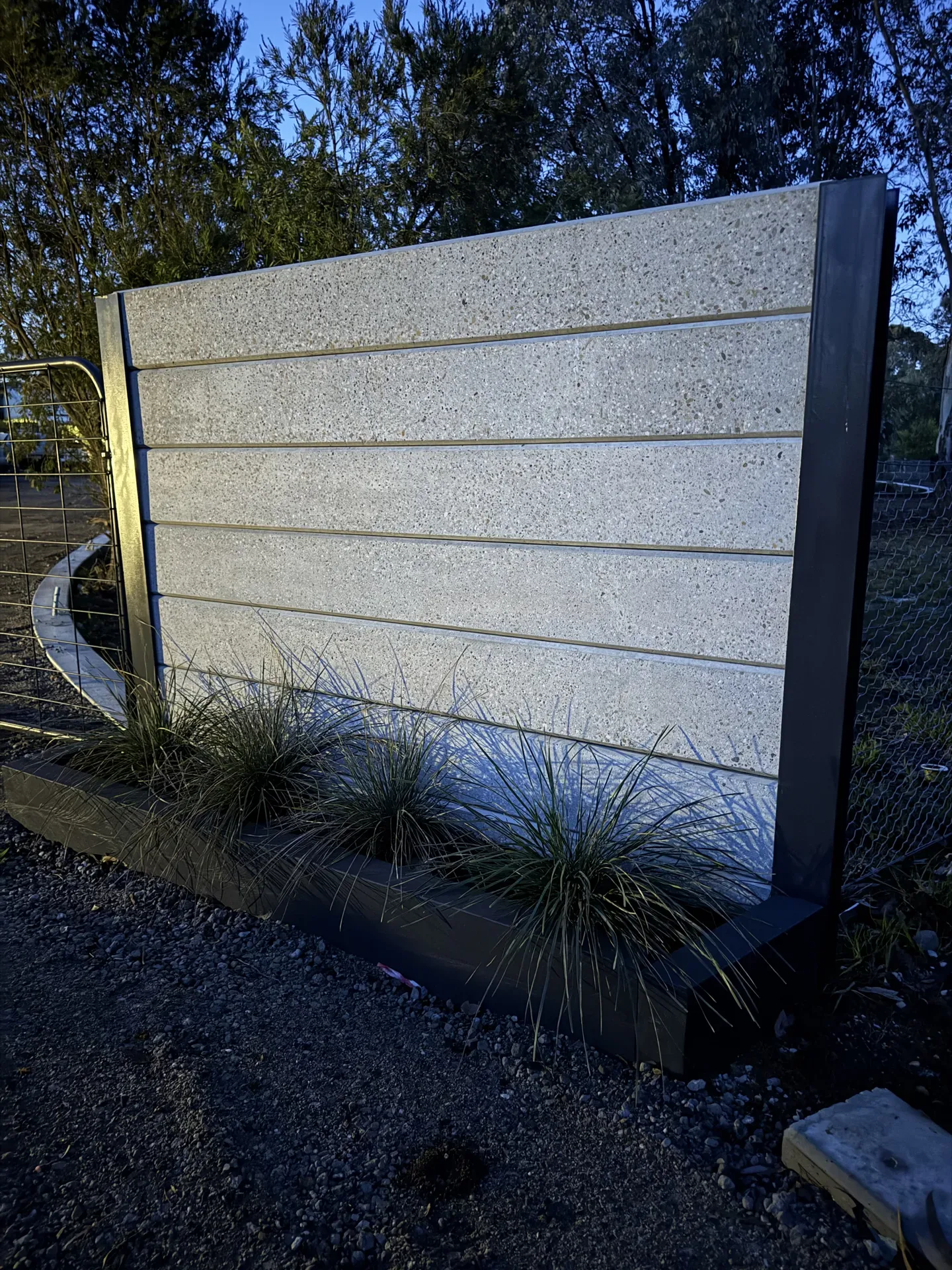 Premium concrete sleeper feature wall by S&R Retaining Walls