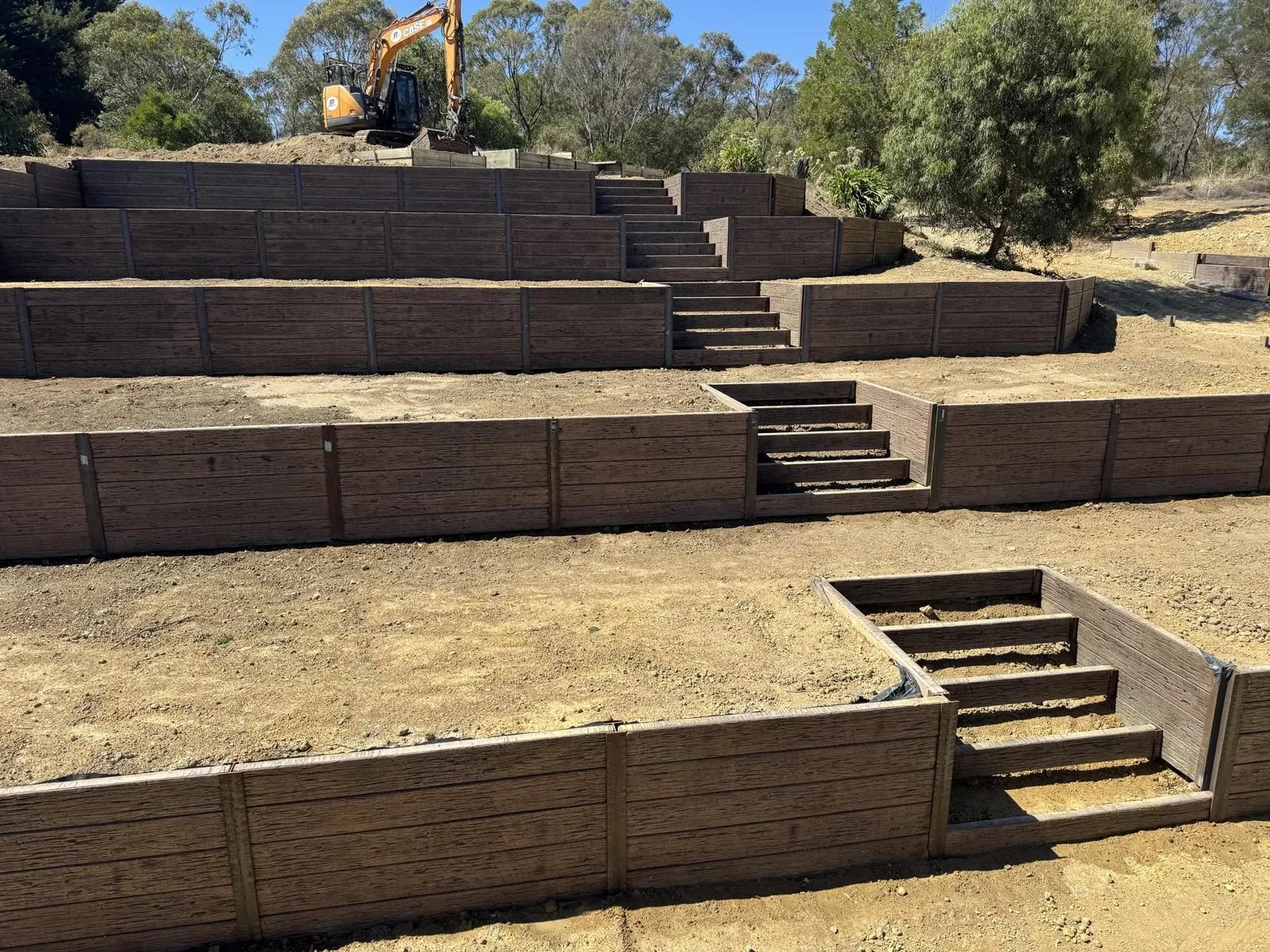 Multi-tier retaining wall build in progress in Geelong